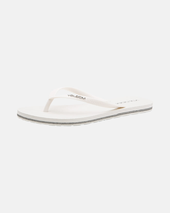 The Volcomotion Womens by Volcom is a white flip-flop sandal featuring a thin thong strap and flat sole, shown on a plain white background.
