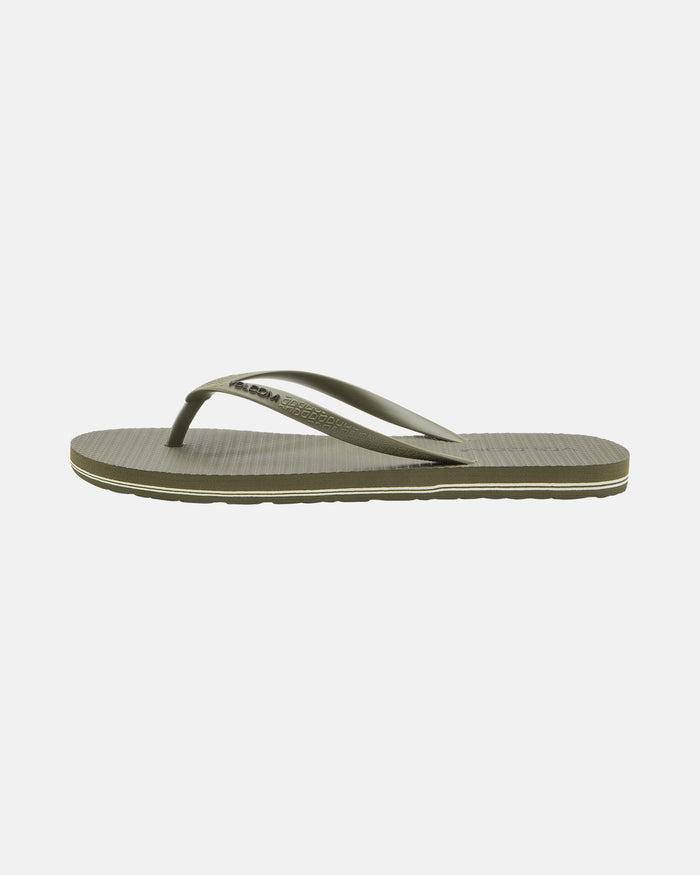 The Volcom Volcomotion Womens flip-flop sandal features an olive green textured footbed and matching straps, shown in a side profile on a plain white background.