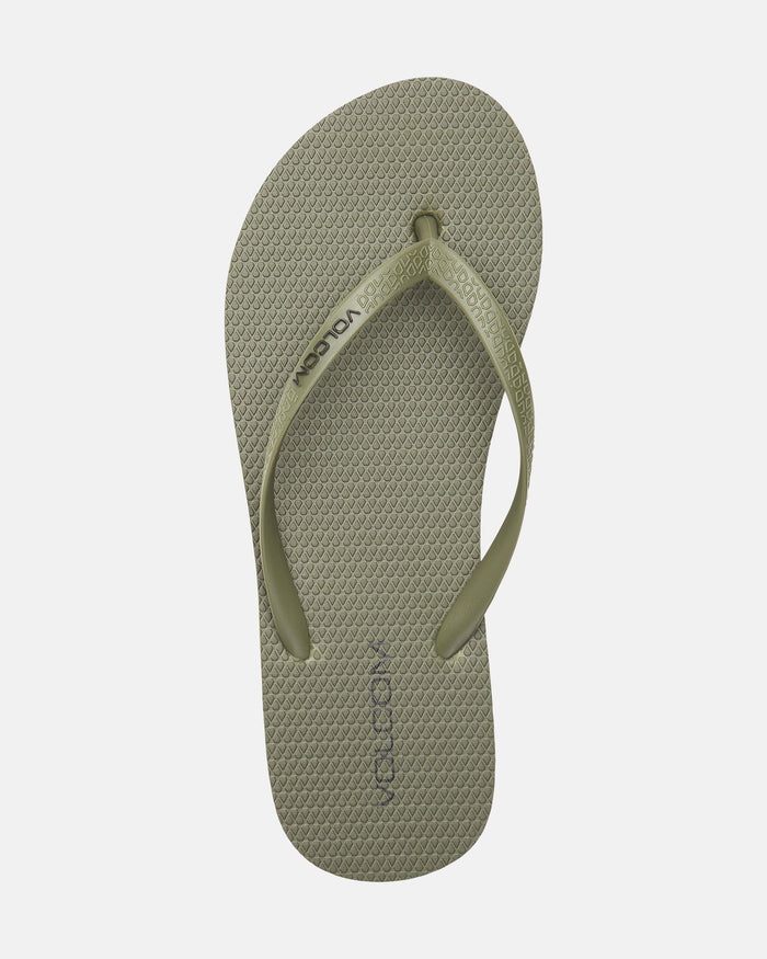 The Volcom Volcomotion Womens flip-flop in olive green features a textured footbed and matching straps with the Volcom logo, shown against a plain white background.