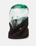 A glass mannequin head displays the Volcom Women’s V.Scout Neckband, a black polyester fleece accessory designed for added warmth, featuring a small logo tag on the front. The plain white background highlights this cozy neck gaiter from Volcom.